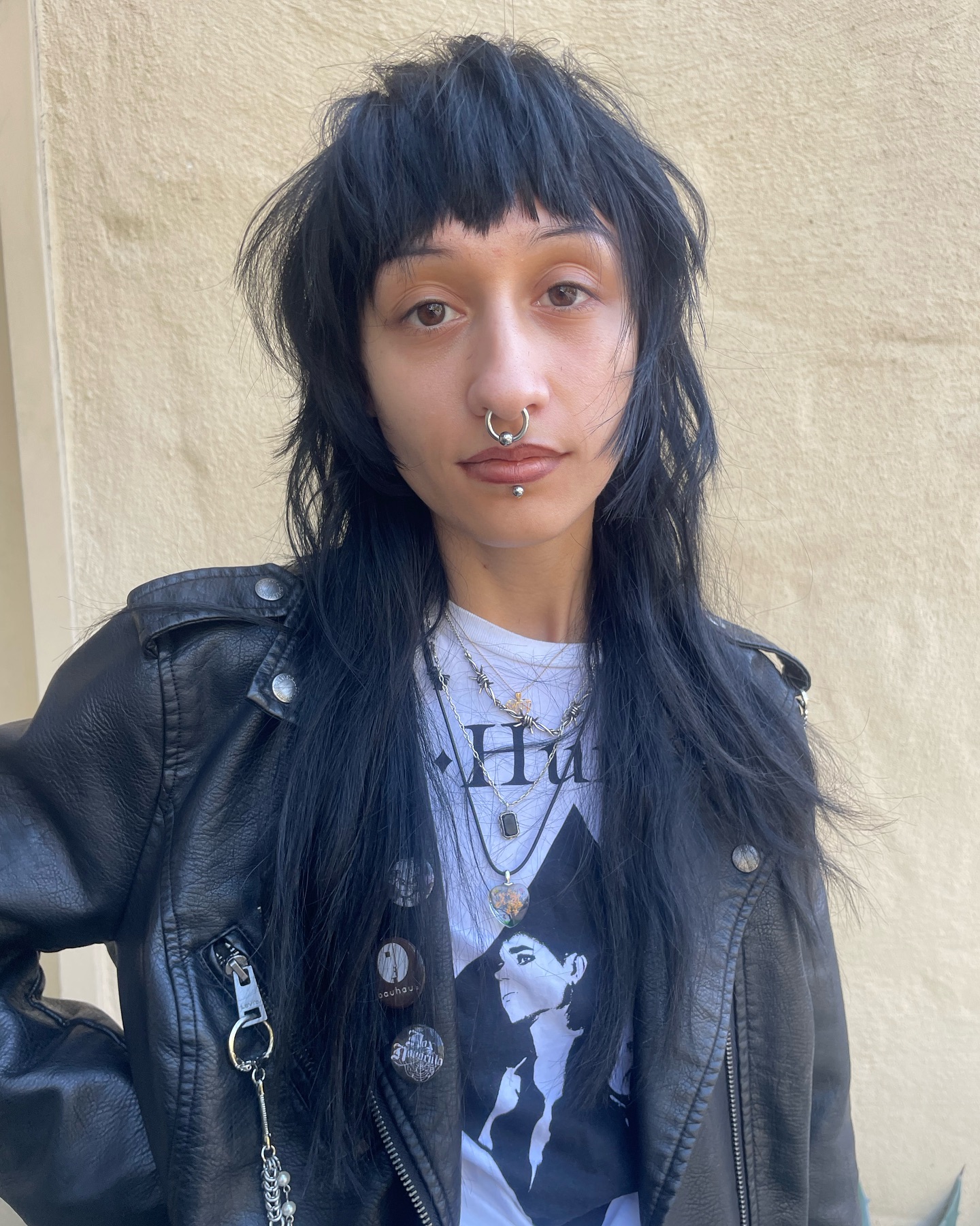 3. Rebel Chic: the Edgy Mullet with Bold Texture and Attitude